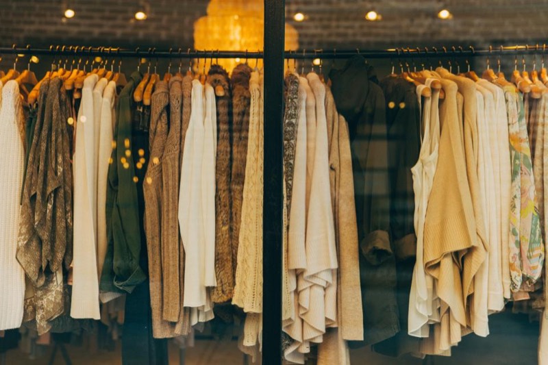 A rail of clothing in a retail store